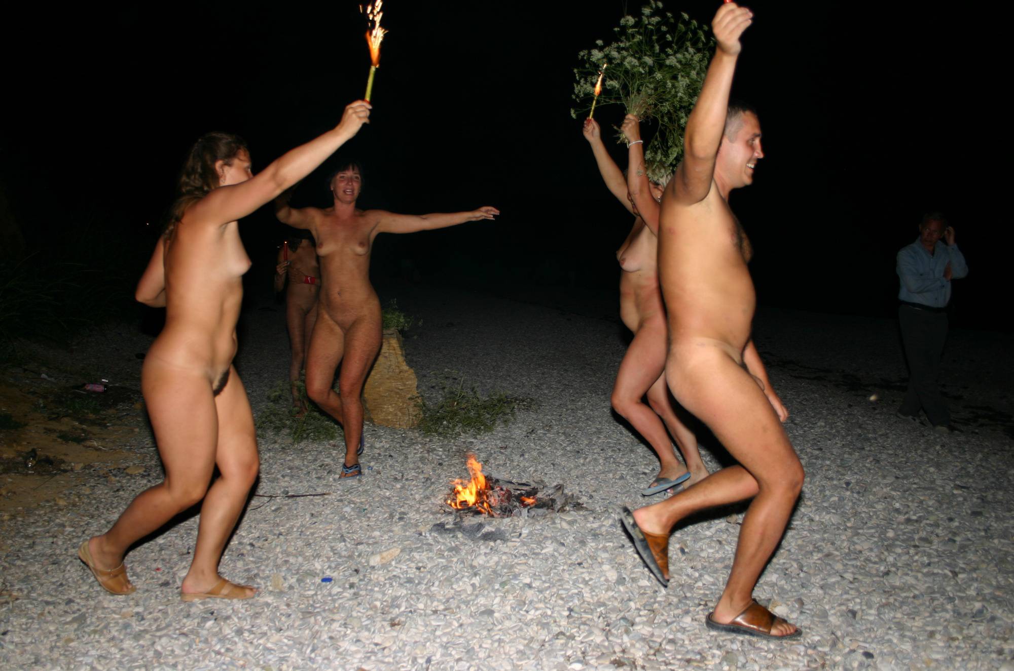 Purenudism Photos Fire and Bow Night Dancing - 3