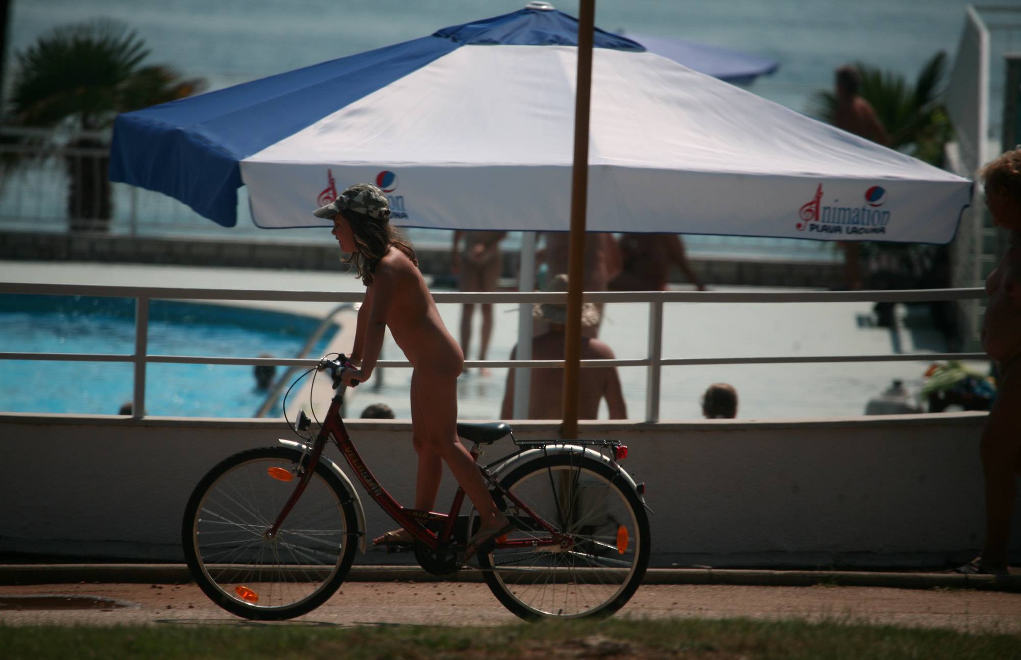 Poolside Nudist Bike Walk - 1