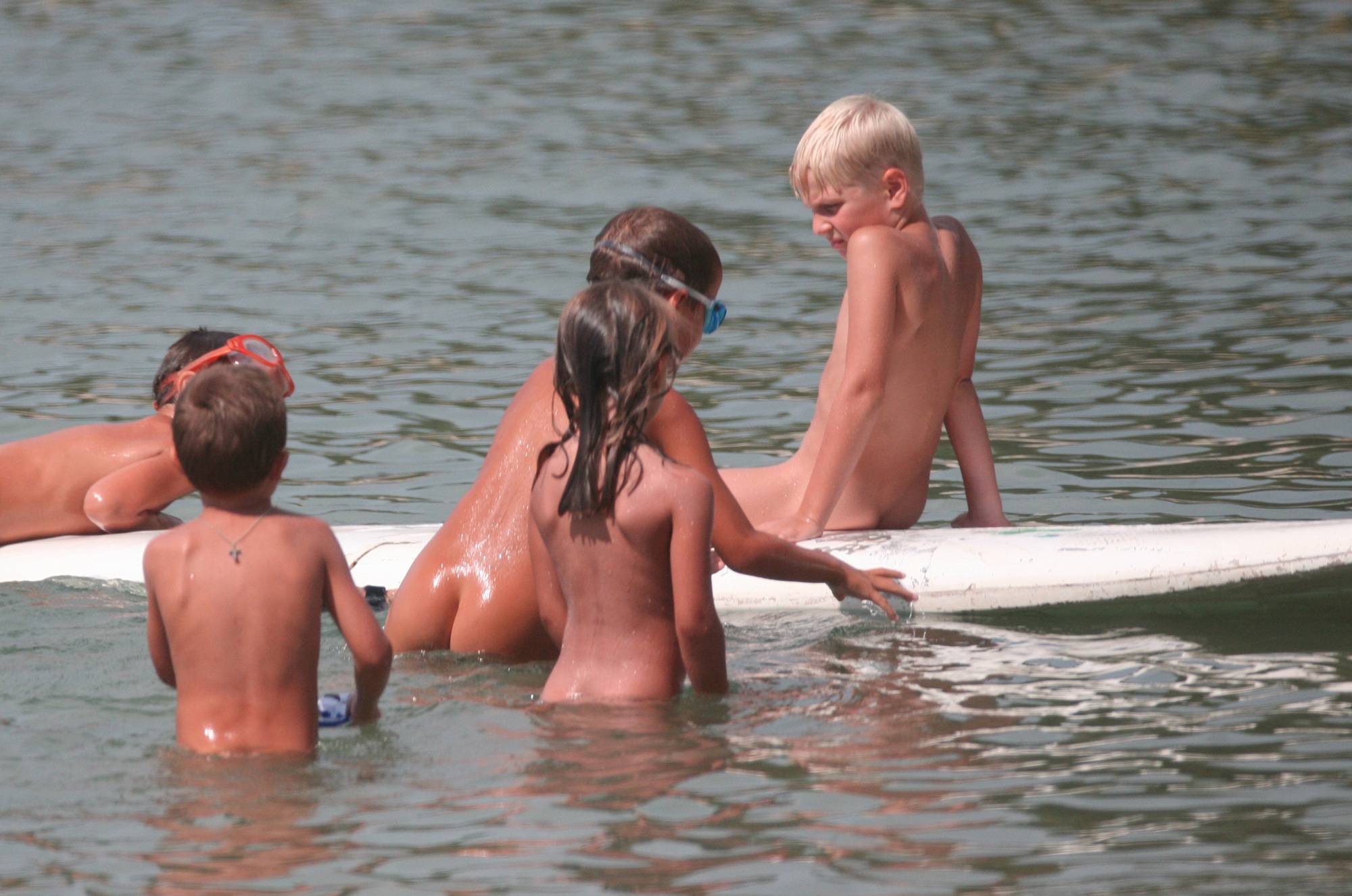 Several Kids On Surfboard - 2
