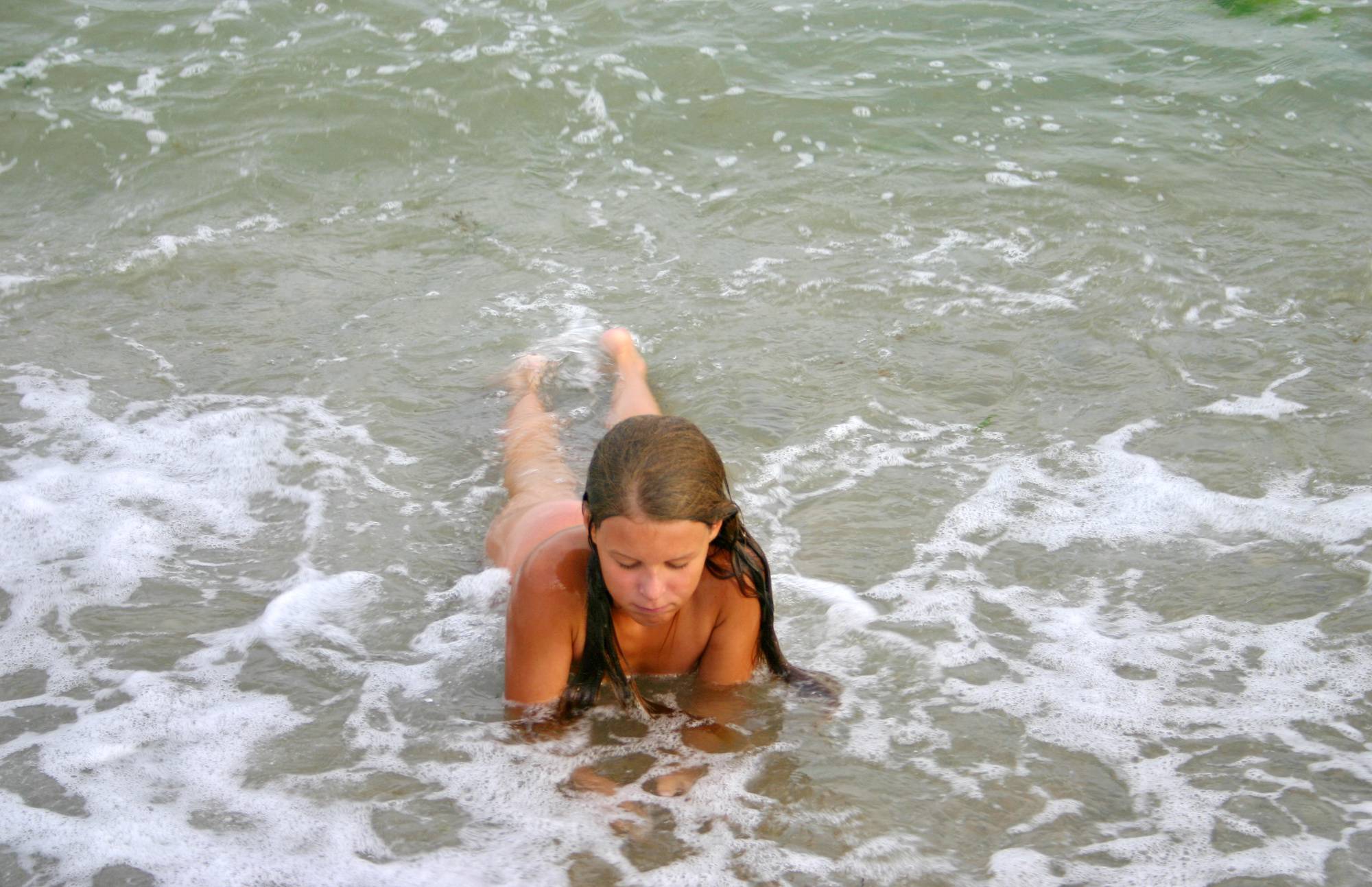 Pure Nudism Images Low Splashes in the Wave - 2