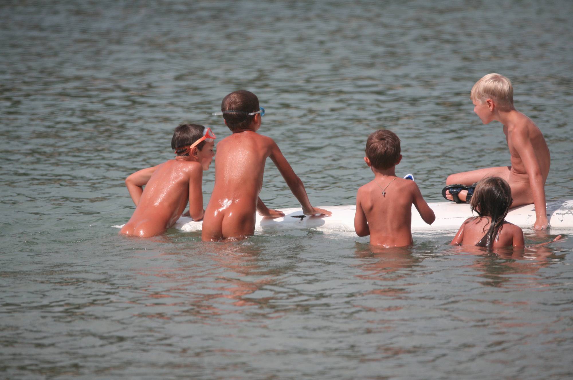 Several Kids On Surfboard - 1