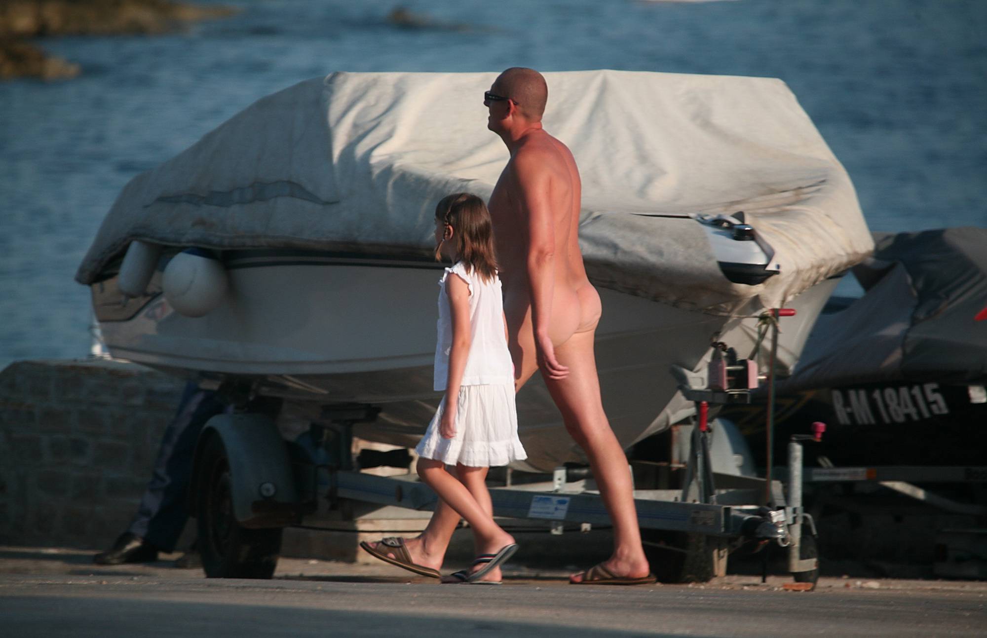 Pure Nudism Gallery Walk by the Boats and Car - 2